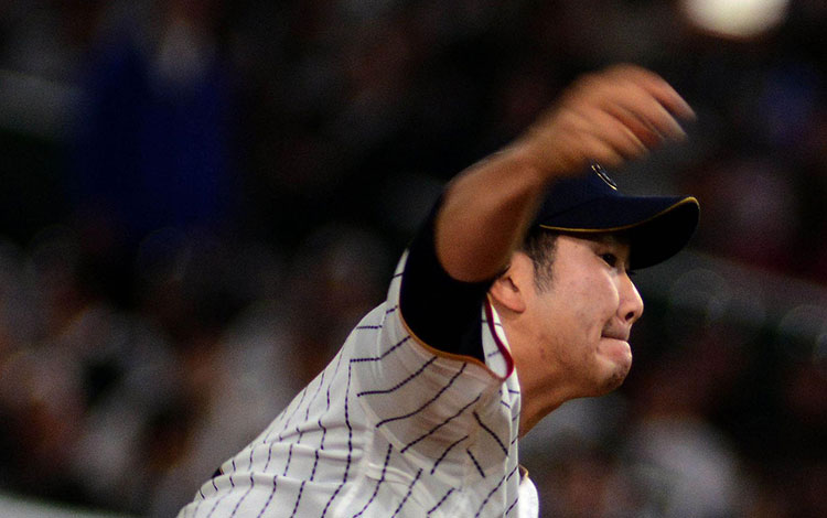 Sugano, pitcher abridor de Japón contra Cuba. Sugano, pitcher abridor de Japón contra Cuba.