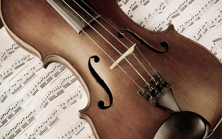 Música de cámara. Violín y partitura.