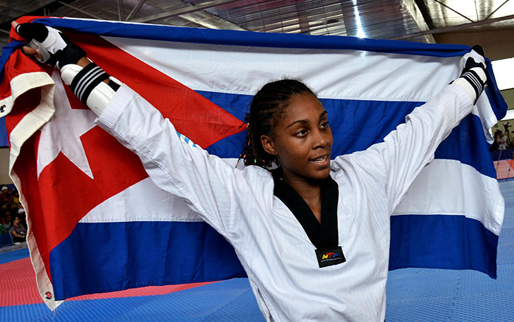 La taekwondoca villaclareña Arlettys De la Caridad Acosta Herrera, una de las titulares de Cuba en Barranquilla. La taekwondoca villaclareña Arlettys De la Caridad Acosta Herrera, una de las titulares de Cuba en Barranquilla.