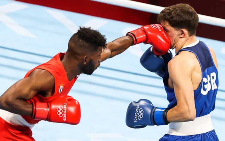 Combate del cubano Andy Cruz contra el británico Luke Mc Cormacky en el boxeo de Tokio 2020. Combate del cubano Andy Cruz contra el británico Luke Mc Cormacky en el boxeo de Tokio 2020.