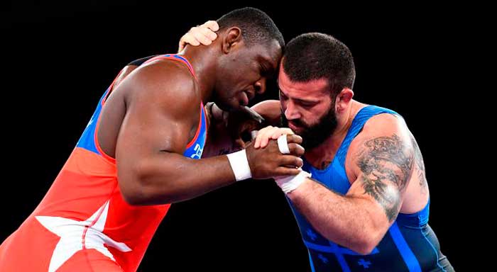 Combate entre el cubano Mijaín López y el georgiano Iakobi Kajaia, en los 130 kg de la lucha grecorromana en Tokio 2020. Combate entre el cubano Mijaín López y el georgiano Iakobi Kajaia, en los 130 kg de la lucha grecorromana en Tokio 2020.