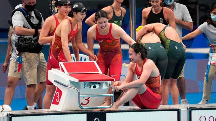 Cuarteta china, oro y récord mundial en el relevo 4x200 de la natación en Tokio 2020. Cuarteta china, oro y récord mundial en el relevo 4x200 de la natación en Tokio 2020.