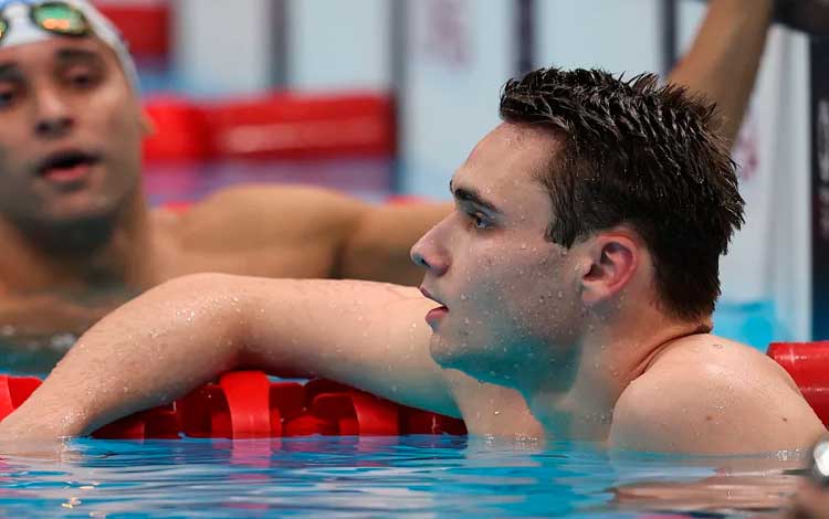 Húngaro Kristof Milak, oro y récord olímpico en los 200 metros estilo mariposa de la natación en Tokio 2020. Húngaro Kristof Milak, oro y récord olímpico en los 200 metros estilo mariposa de la natación en Tokio 2020.