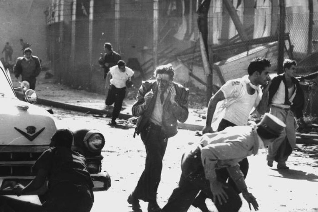 Personas corriendo de la explosión de La Coubre