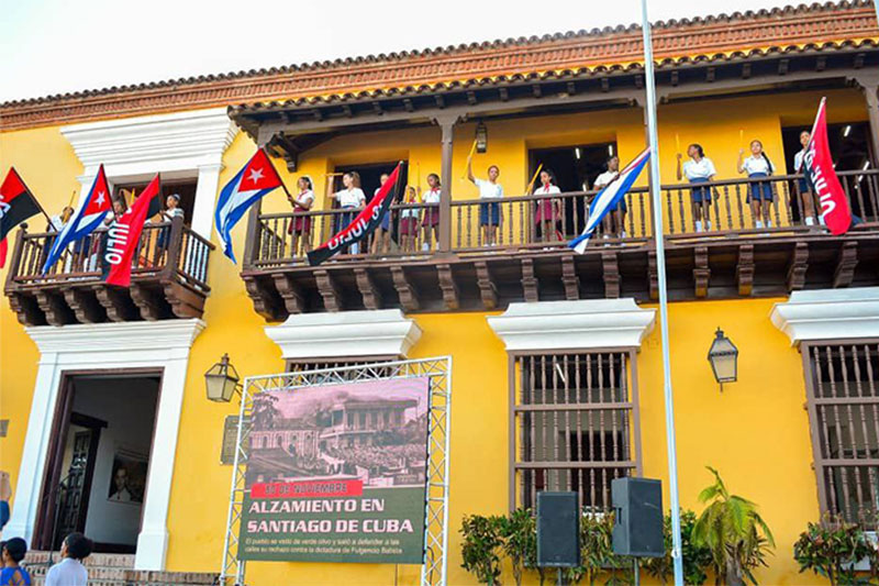 Acto por el aniversario 69 del alzamiento armado de Santiago de Cuba, en la antigua estación de la policía.