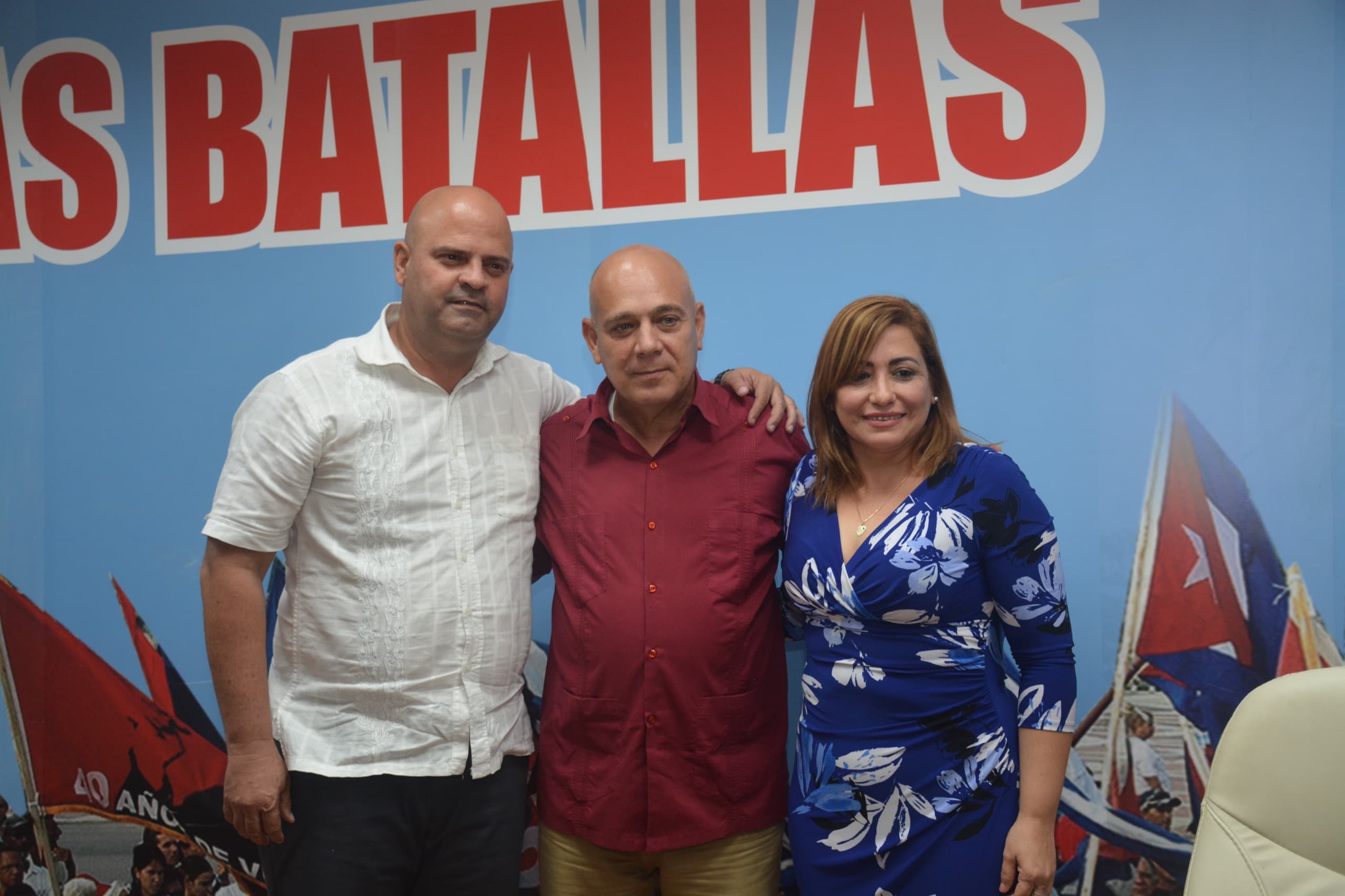 Osnay Miguel Colina, Roberto Morales Ojeda y Susely Morfa González (de izquierda a derecha)