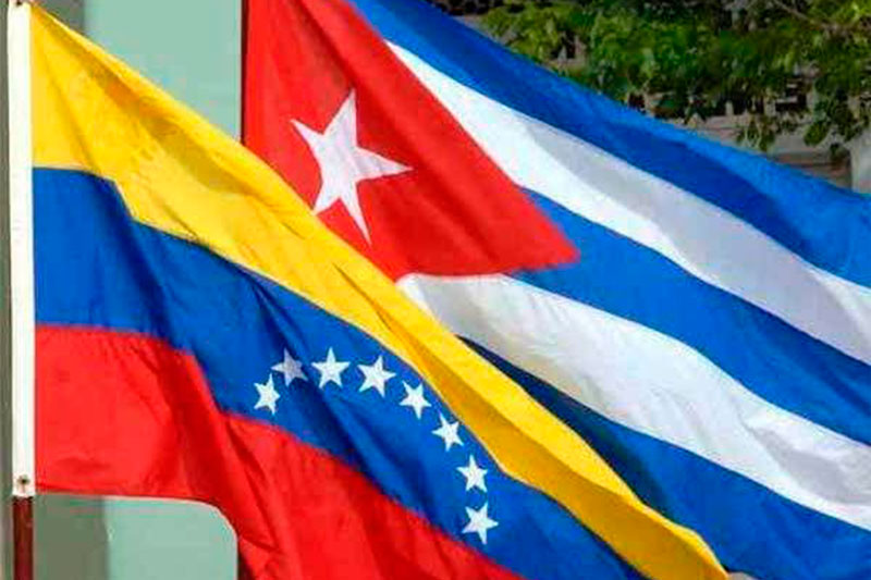 Banderas de Venezuela y Cuba.