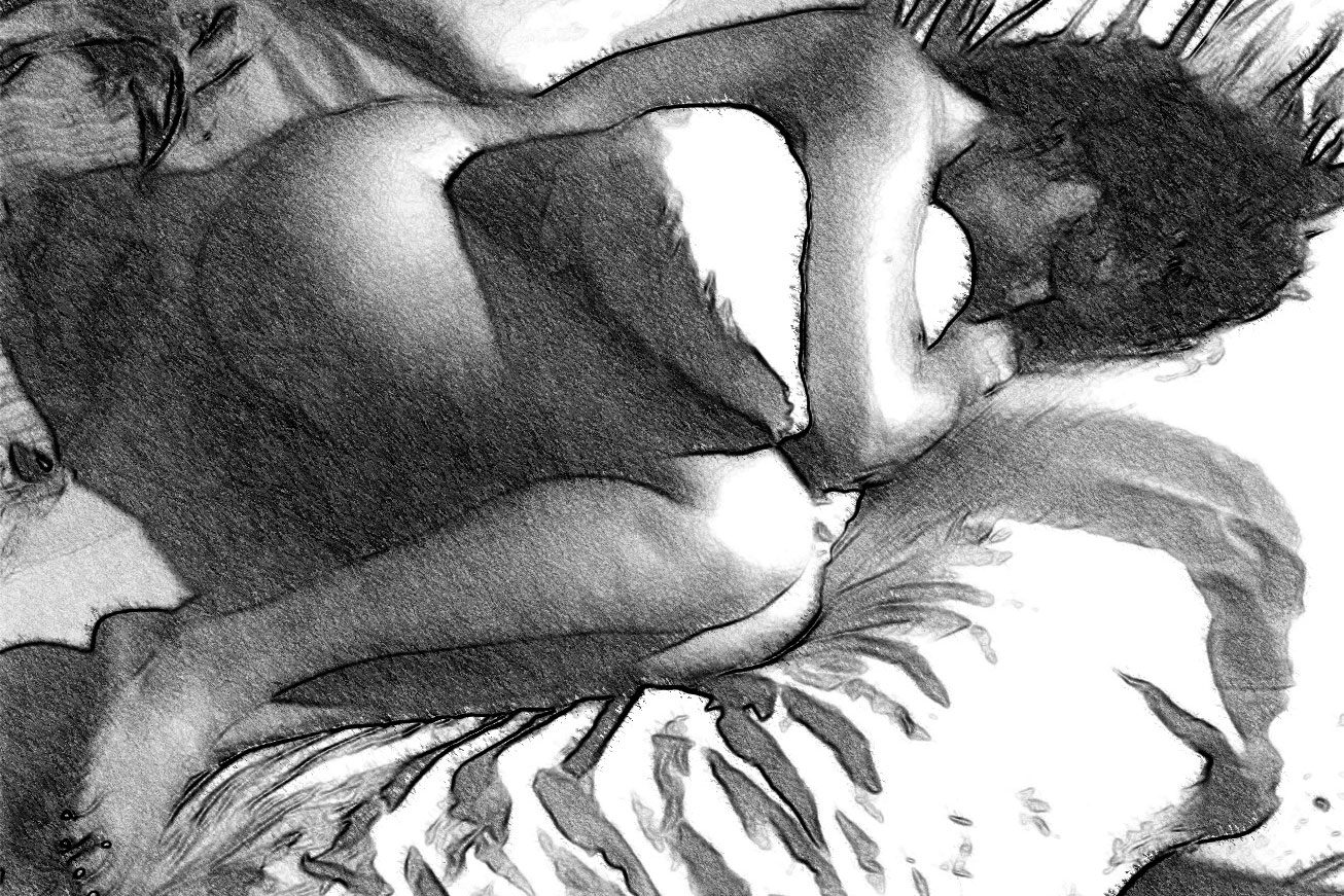 Mujer sobre la cama.